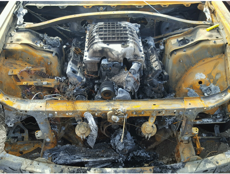 Illustration for article titled This Dodge Challenger SRT Hellcat Looks Like It Actually Traveled To Hell And Back